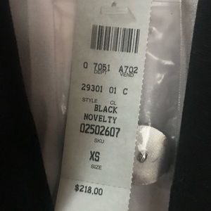 Cache.  Brand new.  Never been worn.   Overcoat